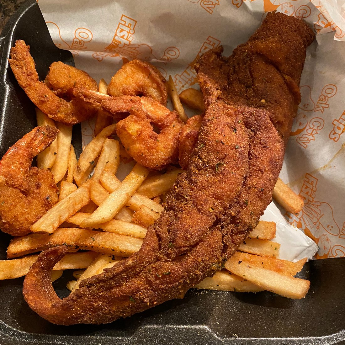 Morgan Street Food Hall signature dishes Oak City Fish and ChipsRaleigh RollsCousins Maine Lobster